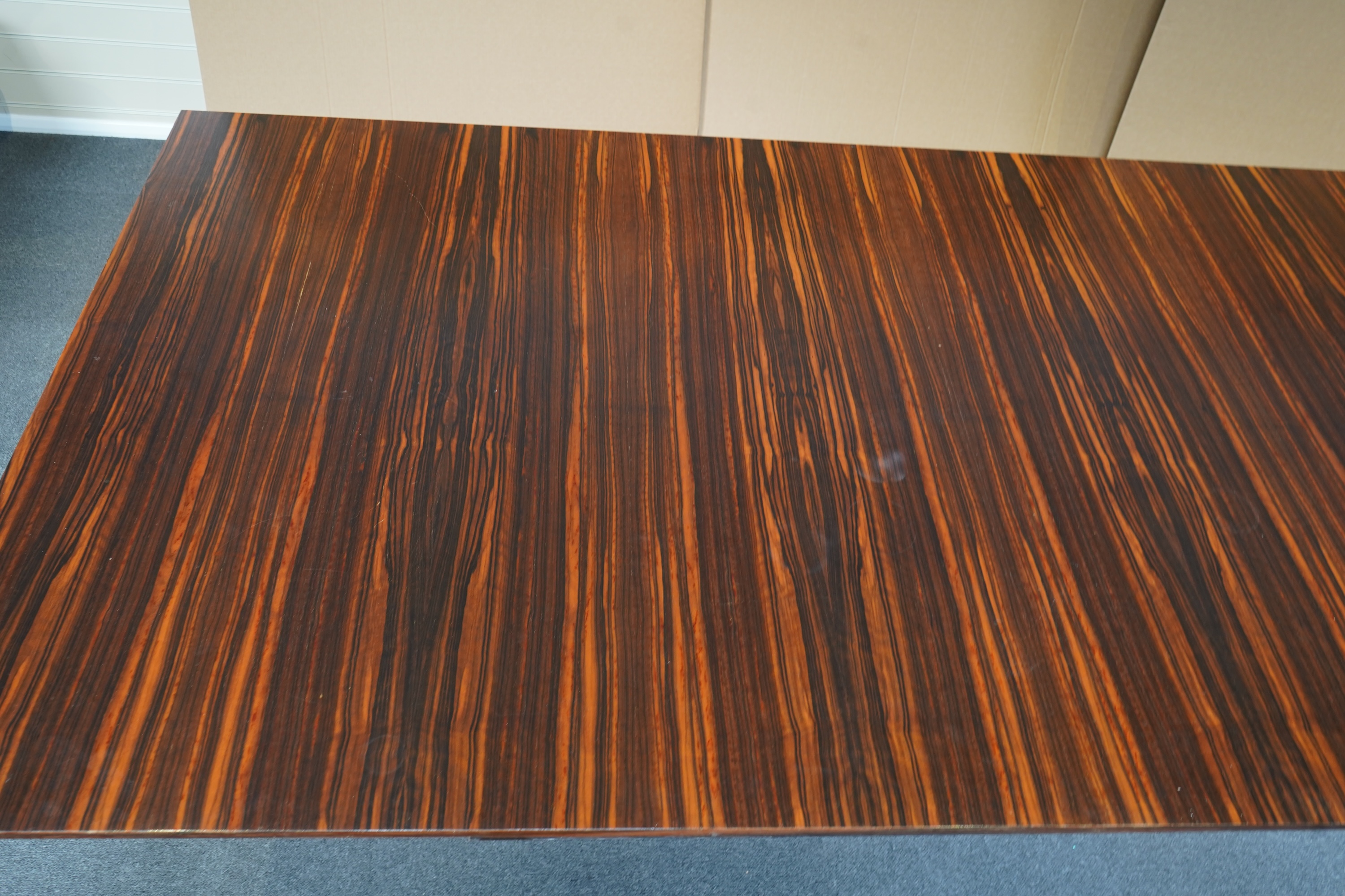 An Art Deco style macassar ebony boardroom/dining table